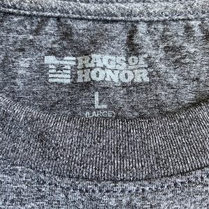 Photo of Rags of Honor logo in back neck of garment